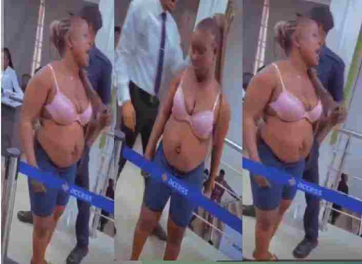 VIDEO: Over Scarcity of New Naira,Confusion, Drama In The Bank Hall As Woman Goes N@ked, Demands For Account….|Eagle’s Sight News